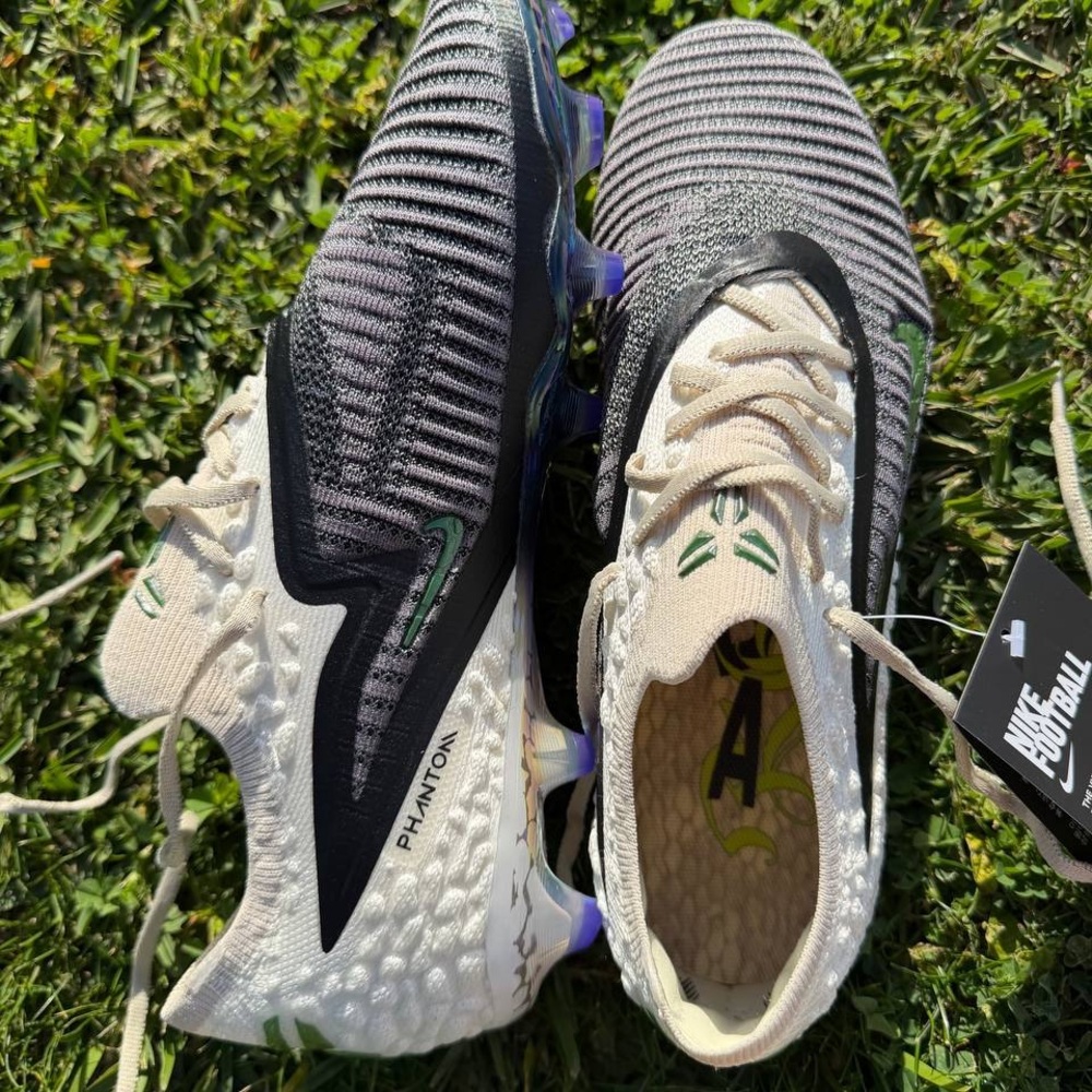 Nike Phantom Cleats in Black, Cream, and Purple